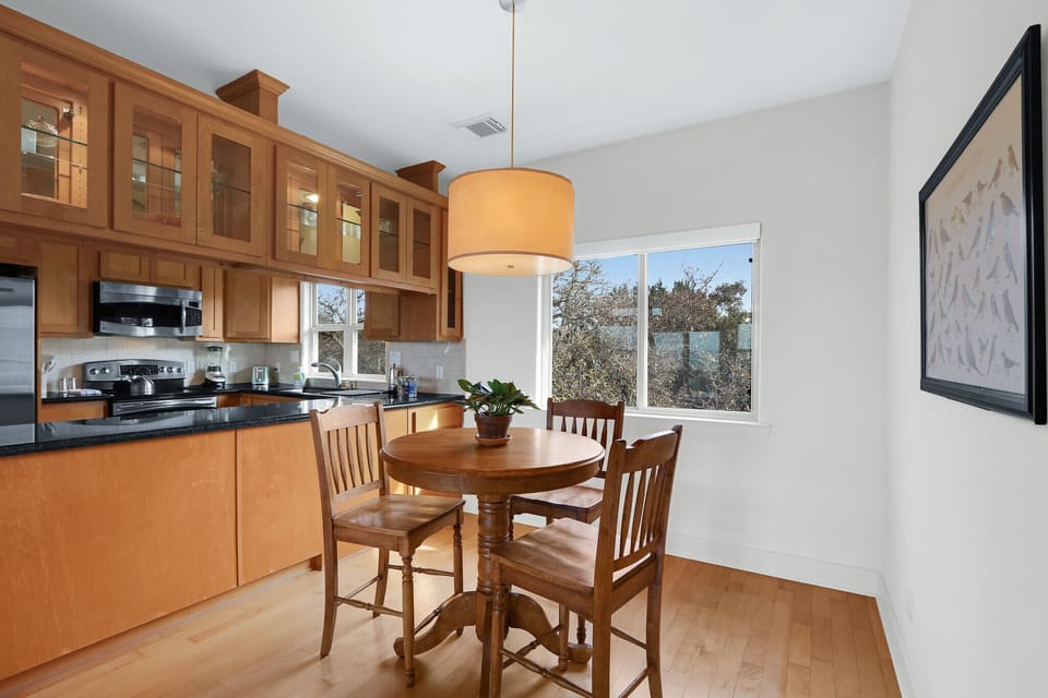 The dining room is conveniently located adjacent to the kitchen