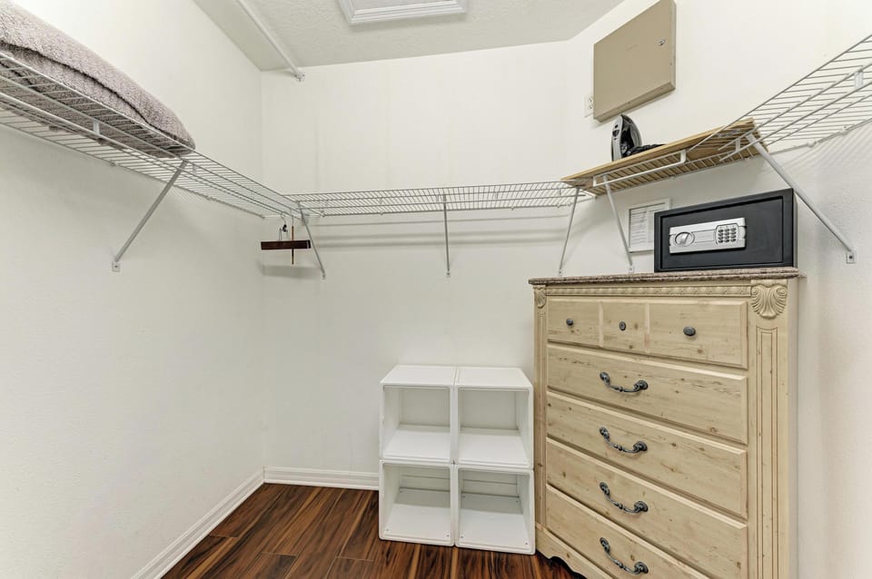 Your spacious walk-in closet features extensive shelving, secure safe storage, and a dresser—plenty of room to unpack and settle in for your entire stay.