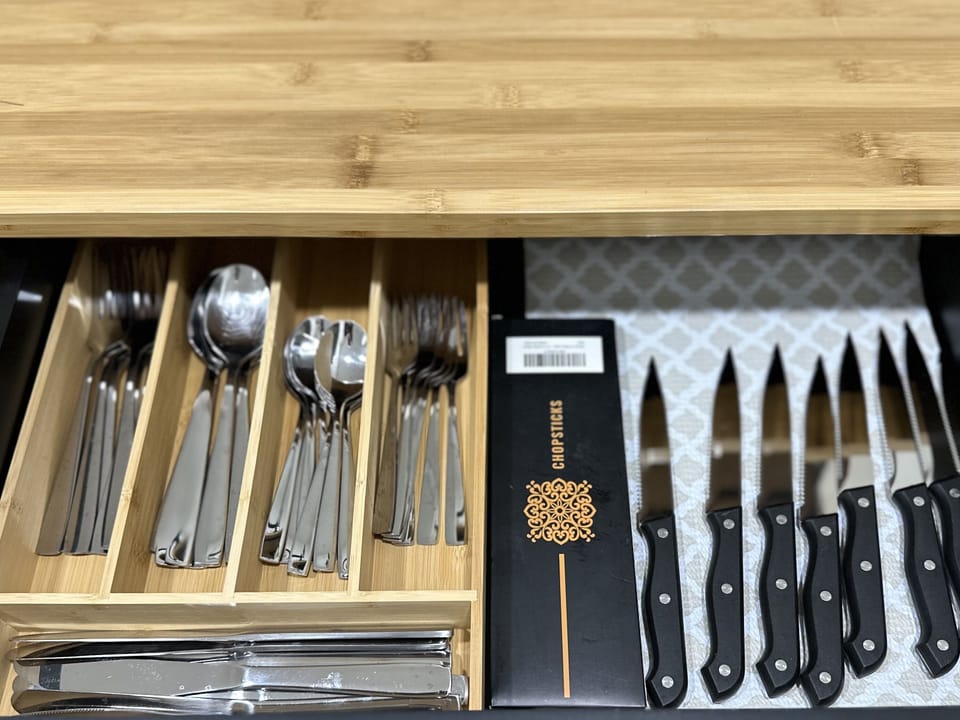 Fully equipped kitchen: Stocked with utensils and chopsticks for all your culinary adventures.