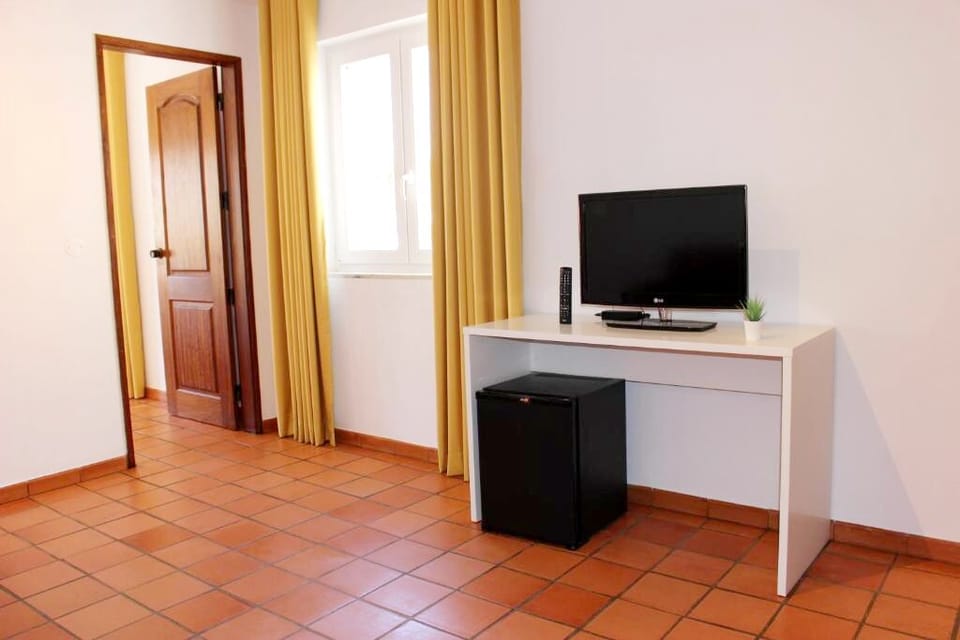 Suite | Living area | 32-inch flat-screen TV with cable channels