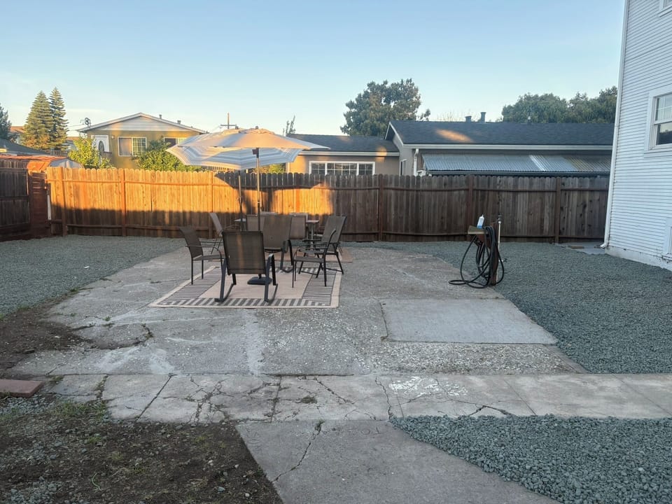 Backyard - spacious with separate dining and seating areas