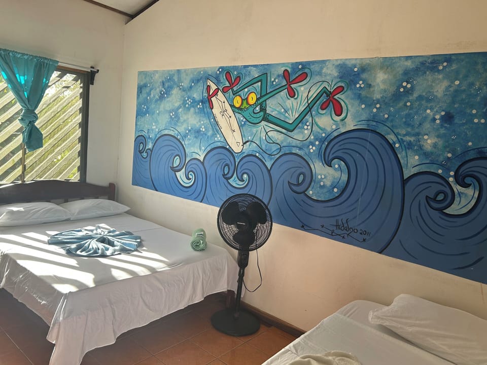 Family Twin Room, Beach View | Laptop workspace, WiFi (free), bed sheets