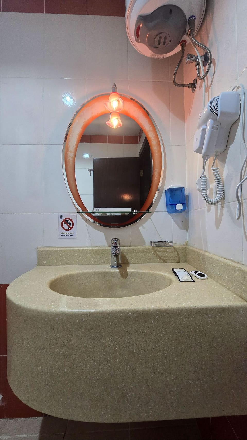 Combined shower/tub, hair dryer, slippers, towels