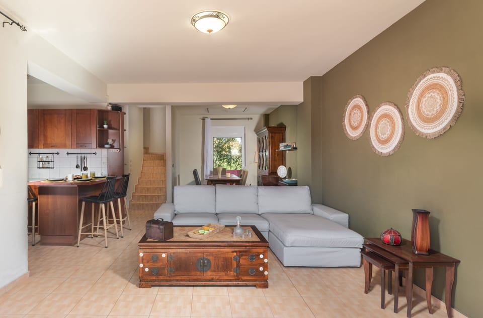 Design Duplex, 3 Bedrooms | Living area | 32-inch Smart TV with cable channels