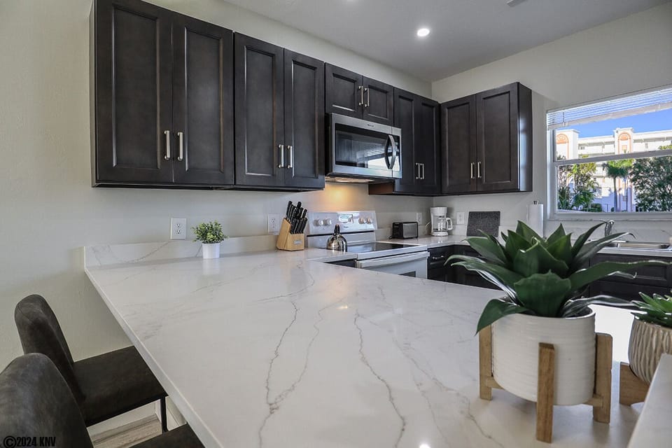 New quartz countertops enhance the beautiful new Kitchen