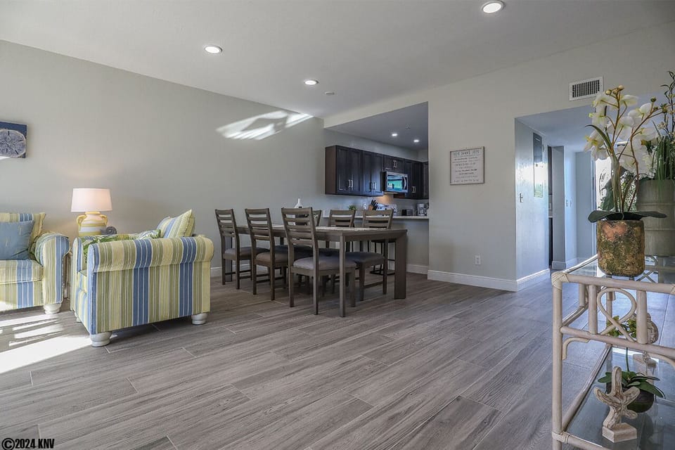 Brand new flooring and ceiling fans throughout