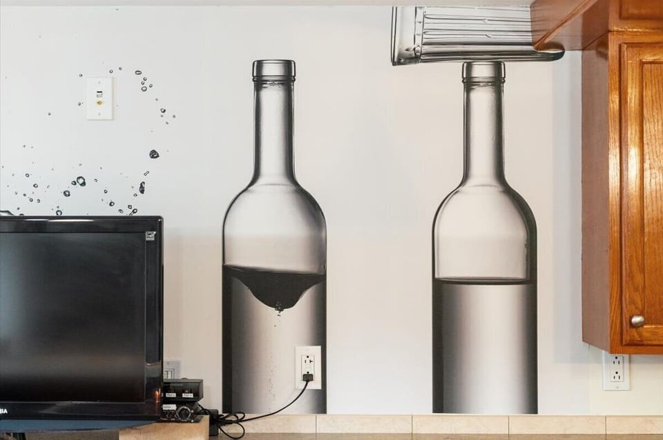 The custom wet bar with smart tv and built-in Bluetooth speaker system