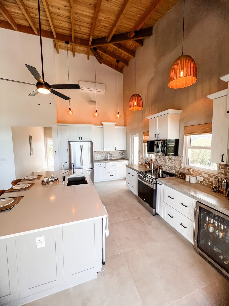 Our luxurious fully equipped kitchen featuring stainless steel appliances, quartz island, and a wine & coffee beverage station including a beverage cooler and ice maker.  Enjoy fresh filtered water from our RO system!