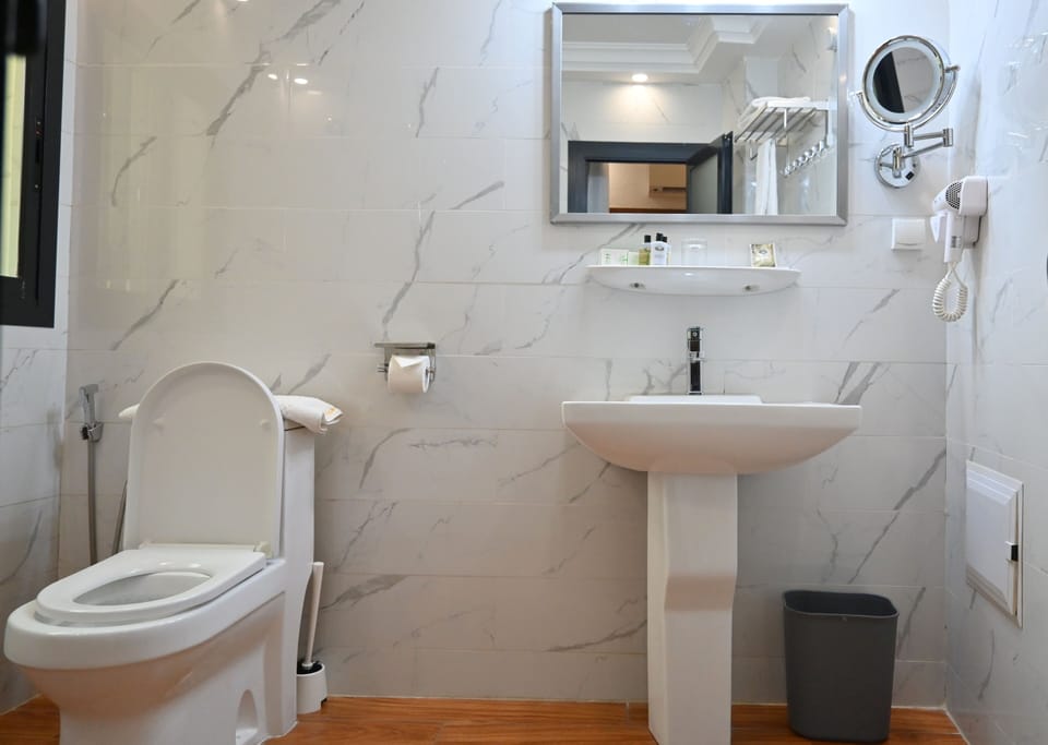 Deluxe Double Room, City View | Bathroom | Shower, hydromassage showerhead, designer toiletries, hair dryer