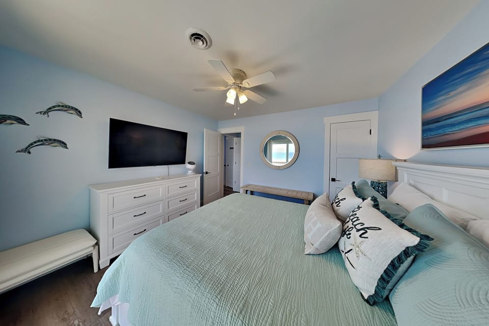 Fourth Bedroom - Queen Bed, TV + Balcony Access