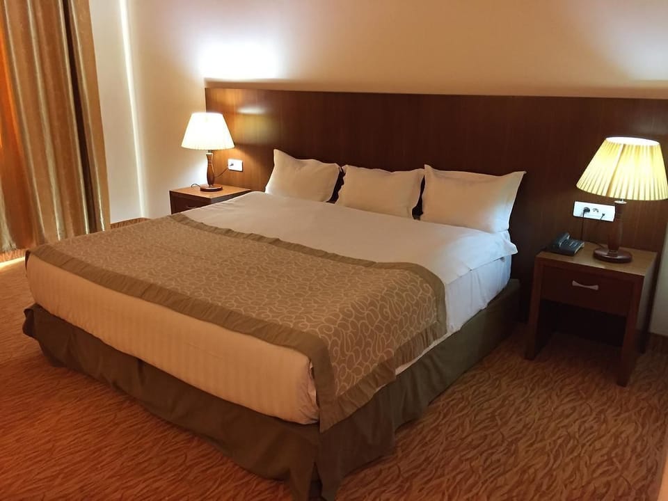 Standard Room, Private Bathroom, City View | Blackout drapes, soundproofing, WiFi (free)