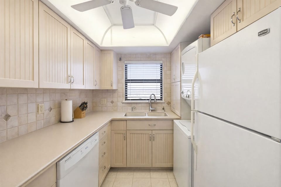 Bright and airy kitchen with white cabinetry