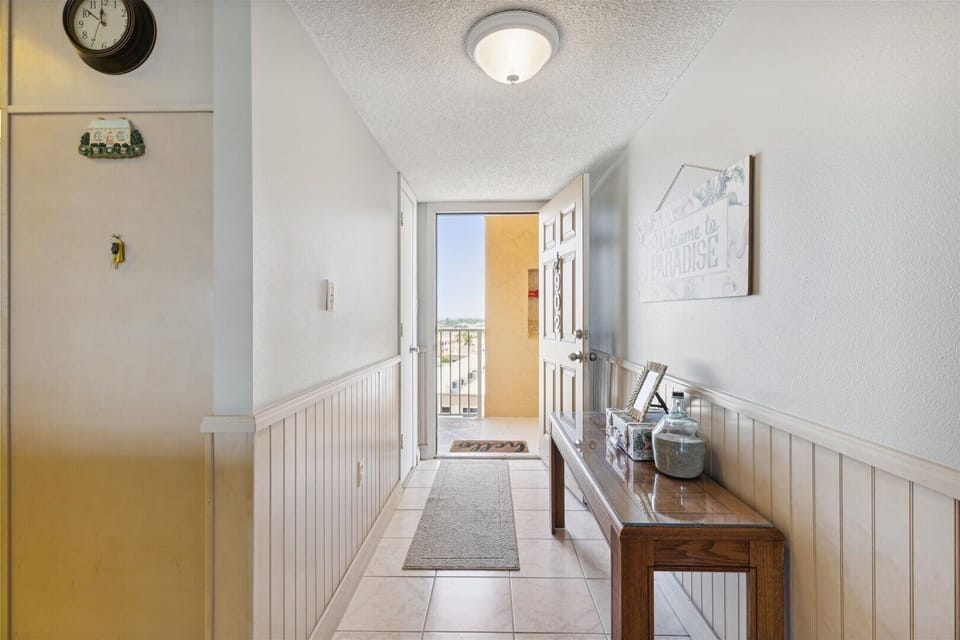 Inviting hallway leading to a private retreat