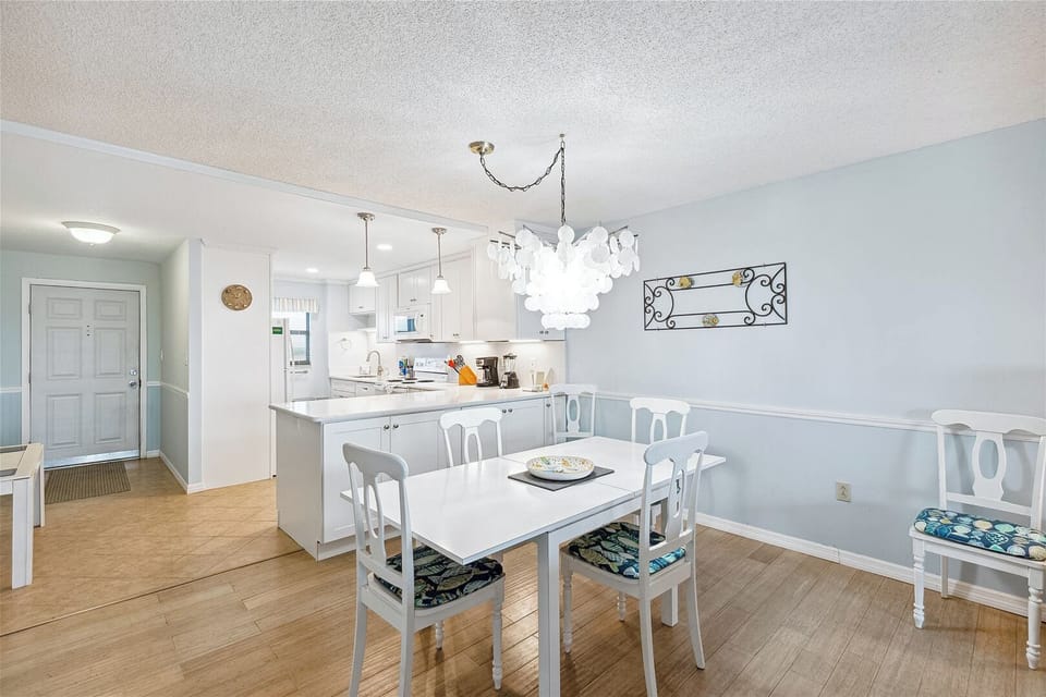 Elegant dining area with seating for four