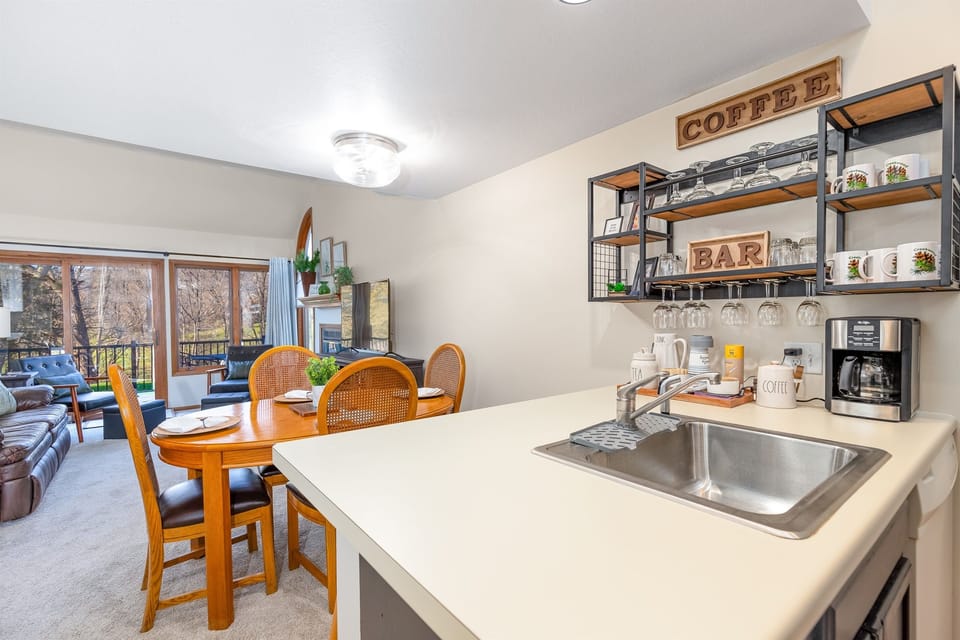 Kitchen opening onto the dining area and living room