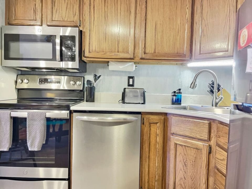 updated kitchen with stainless steel appliances.