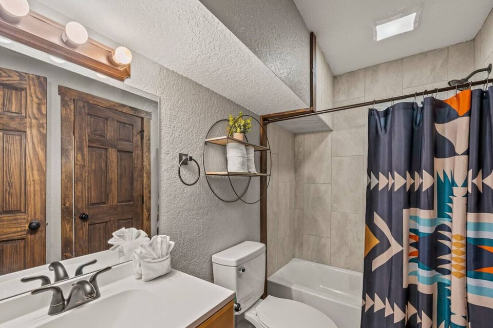 The attached full bathroom also has a convenient shower-tub combo.