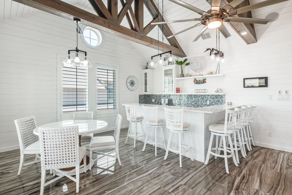 Interior - Seating for 4 at the table and 7 at the wet bar—ideal for gatherings big and small.