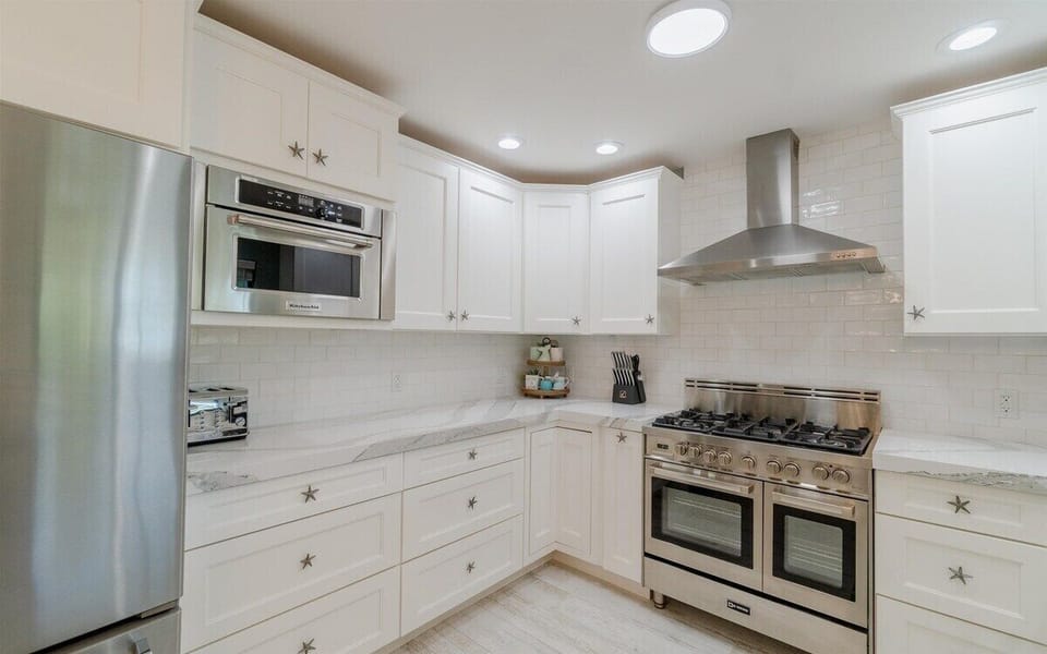 Where culinary dreams take flight: A fully-equipped kitchen, the heart of the home, ready to turn ingredients into memories.