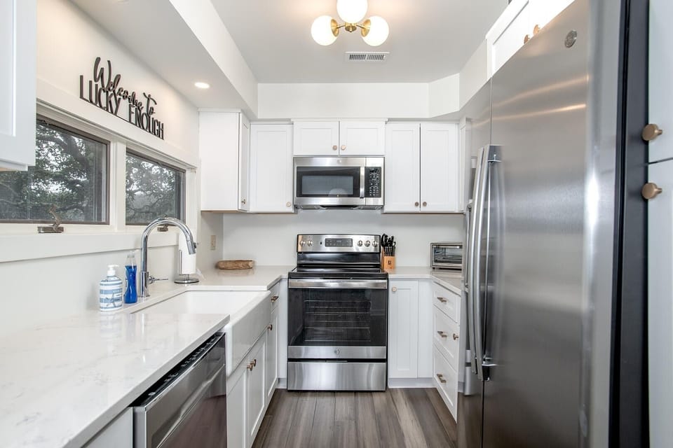 Townhome, 4 Bedrooms | Private kitchen | Coffee/tea maker, fridge, oven, toaster