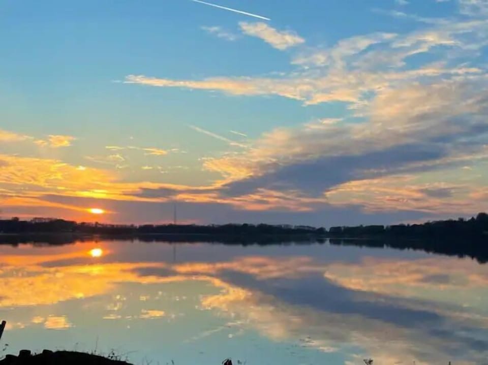 Unreal sunsets every night, front row seats from your private lakefront.