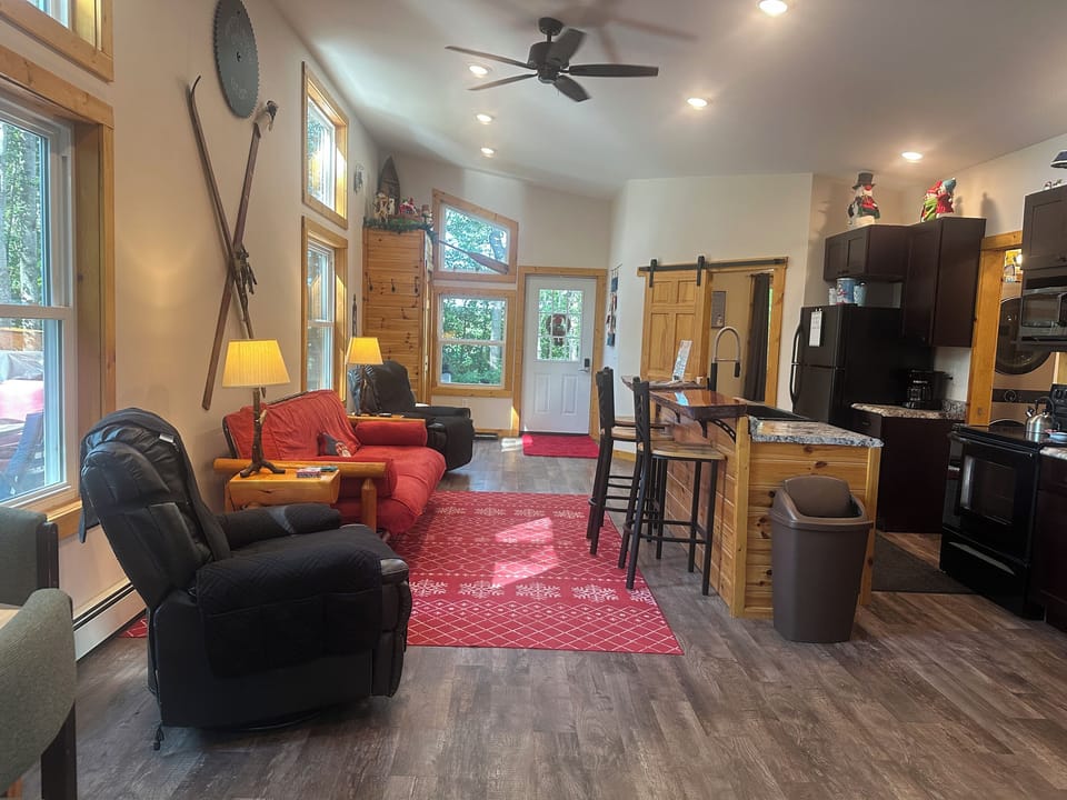 Living Room, Kitchen, and Dining Area showing front door