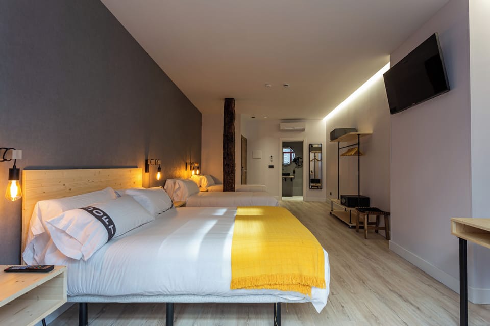 Family Quadruple Room, Balcony, City View | Memory foam beds, in-room safe, desk, laptop workspace