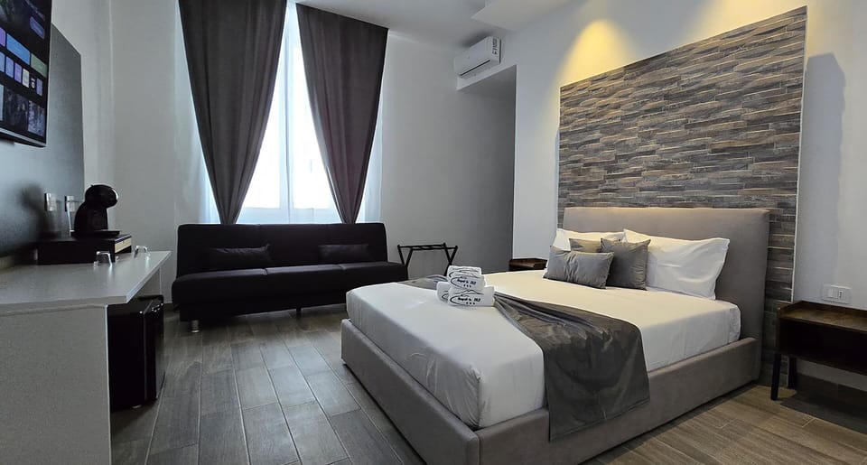 Luxury Quadruple Room | Hypo-allergenic bedding, down comforters, memory foam beds, in-room safe
