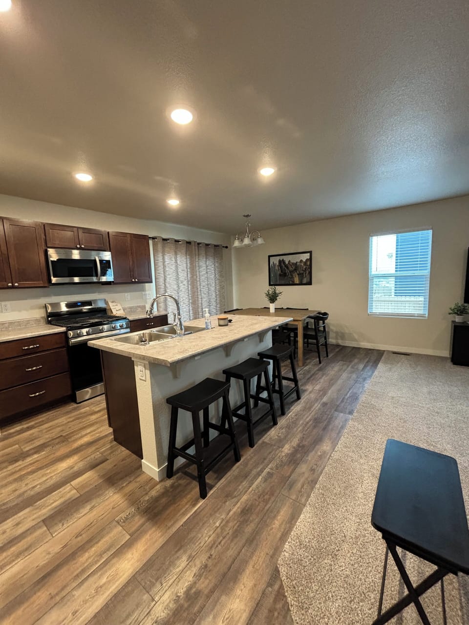 Kitchen with stove, microwave, and dishwasher.
