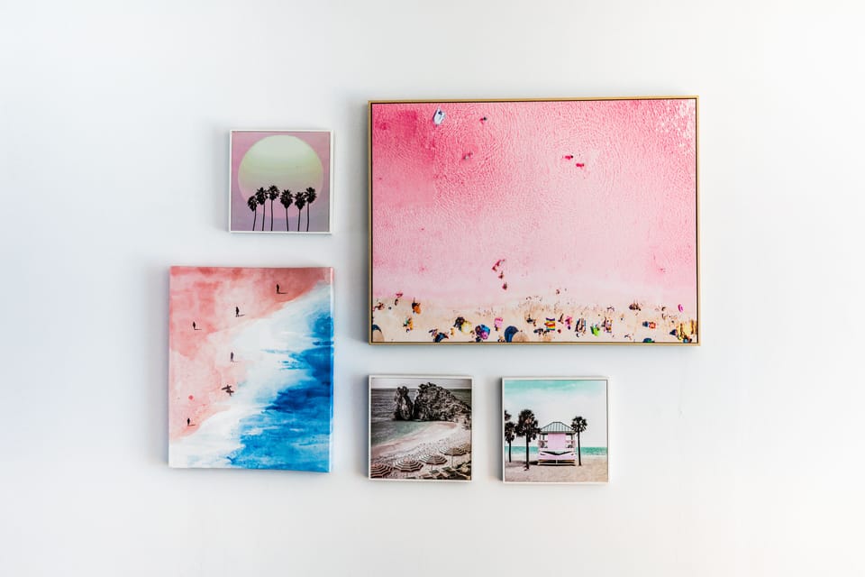 Colorful artwork and personal touches liven up the space.
