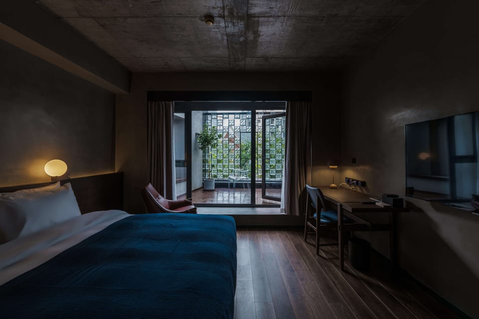 Design Room | Premium bedding, down comforters, memory foam beds, free minibar