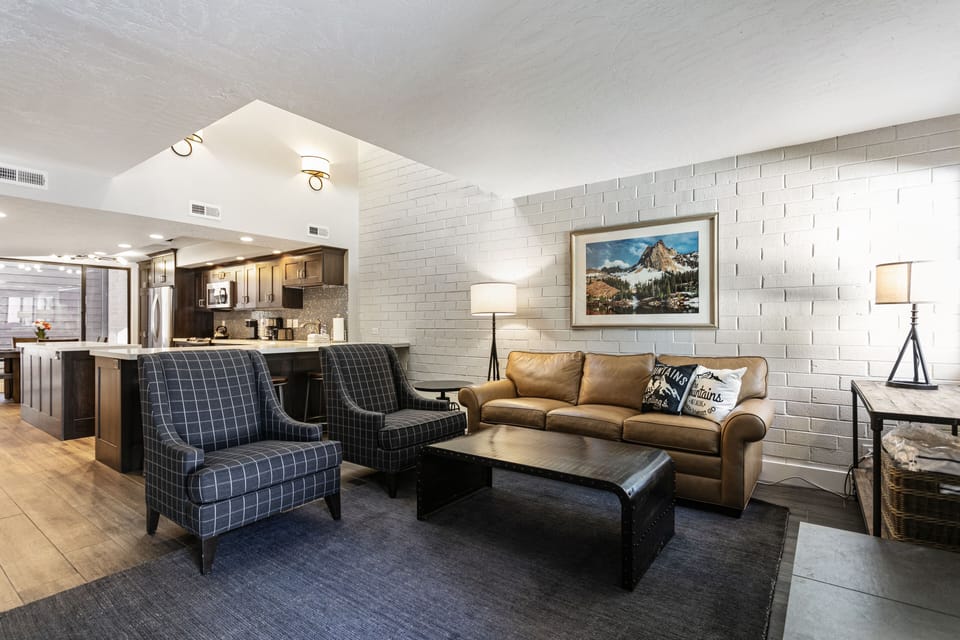 Deluxe Condo, Golf View | Living area | Fireplace