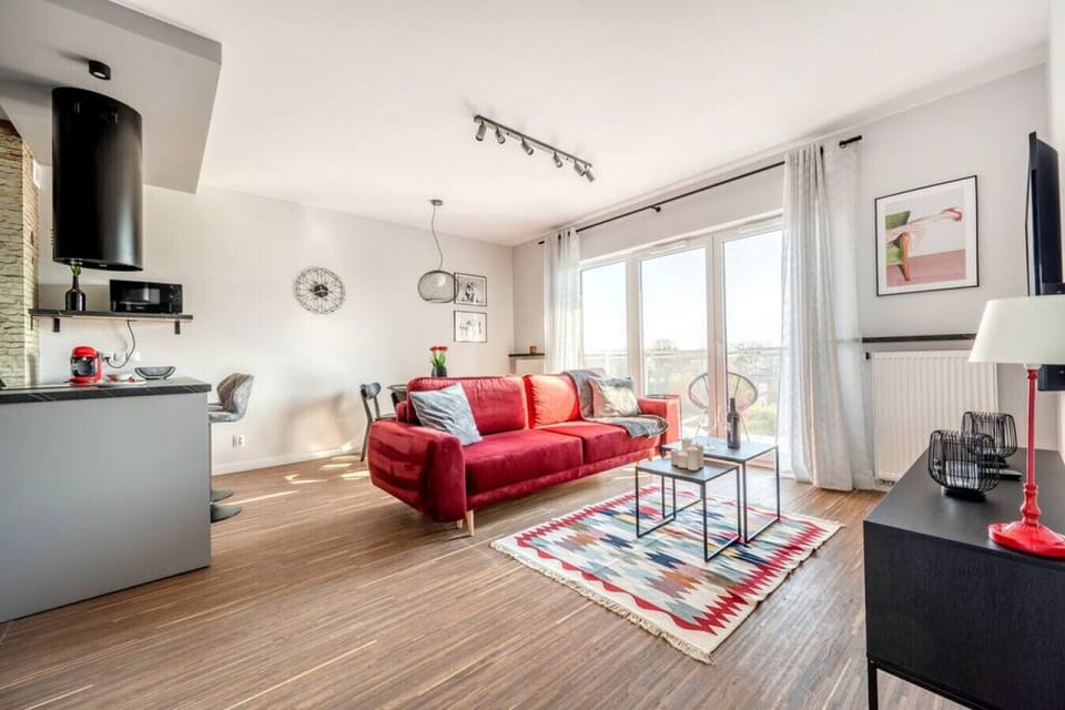 Comfortable Living Room with Sofa Bed and Smart TV | Book Now with RENTUJEMY