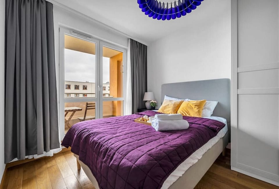 Comfortable Bedroom with Queen Bed and Private Balcony | Book Now with RENTUJEMY