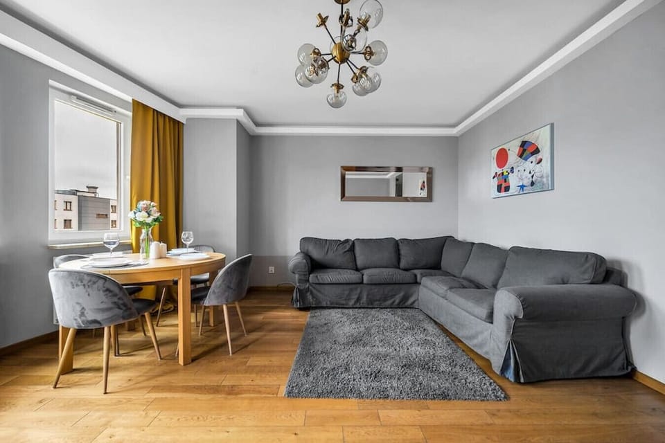 Comfortable Living Room with Sofa Bed and Smart TV | Book Now with RENTUJEMY