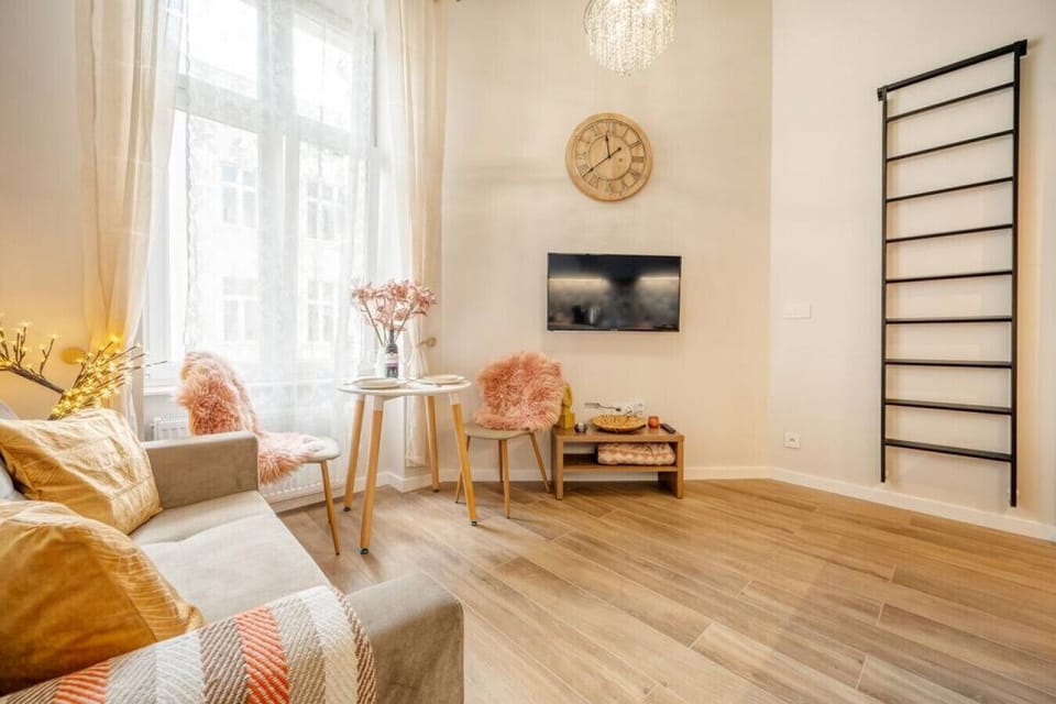 Comfortable Living Room with Sofa Bed and Smart TV | Book Now with RENTUJEMY