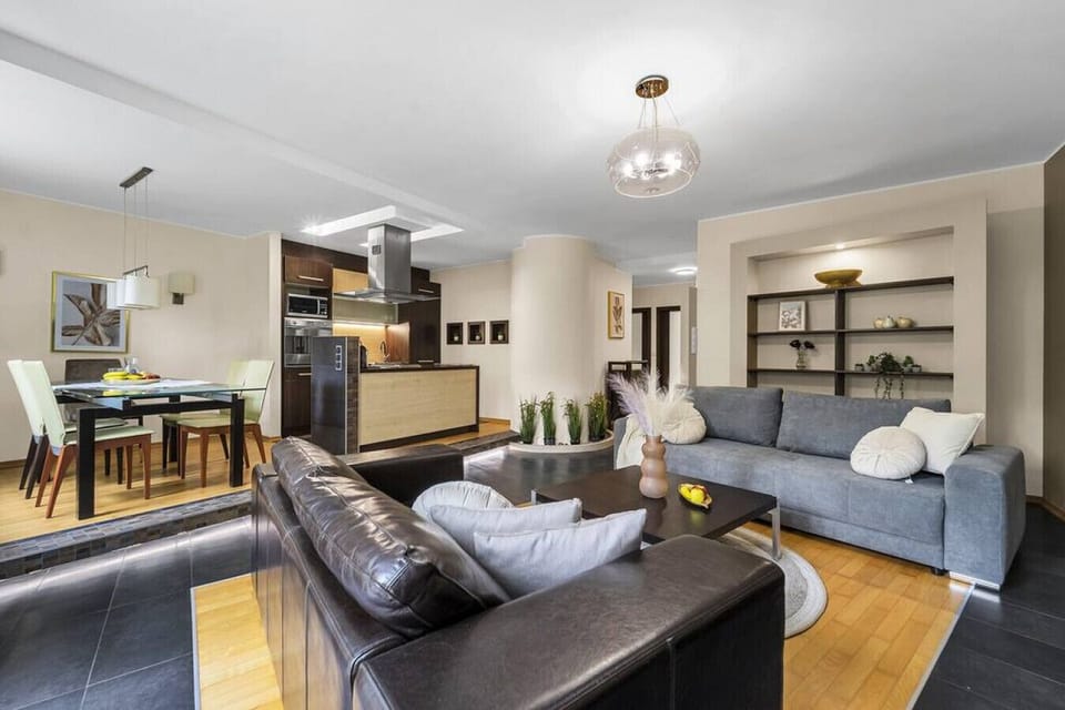 Comfortable Living Room with Sofa Bed and Smart TV | Book Now with RENTUJEMY