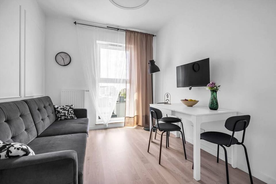 Comfortable Sofa Bed with Smart TV and Dining Area | RENTUJEMY.COM