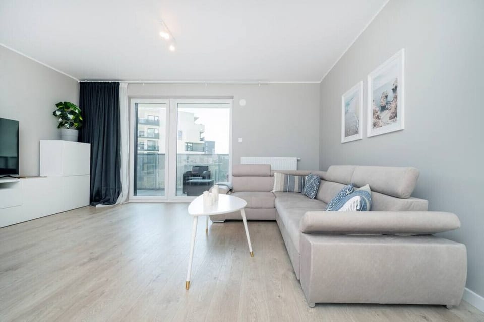 Main Living Area with a Smart TV- Book Now with RENTUJEMY.COM