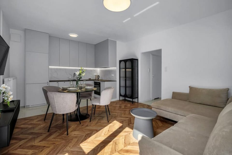 Comfortable Living Room with Sofa Bed and Smart TV | Book Now with RENTUJEMY