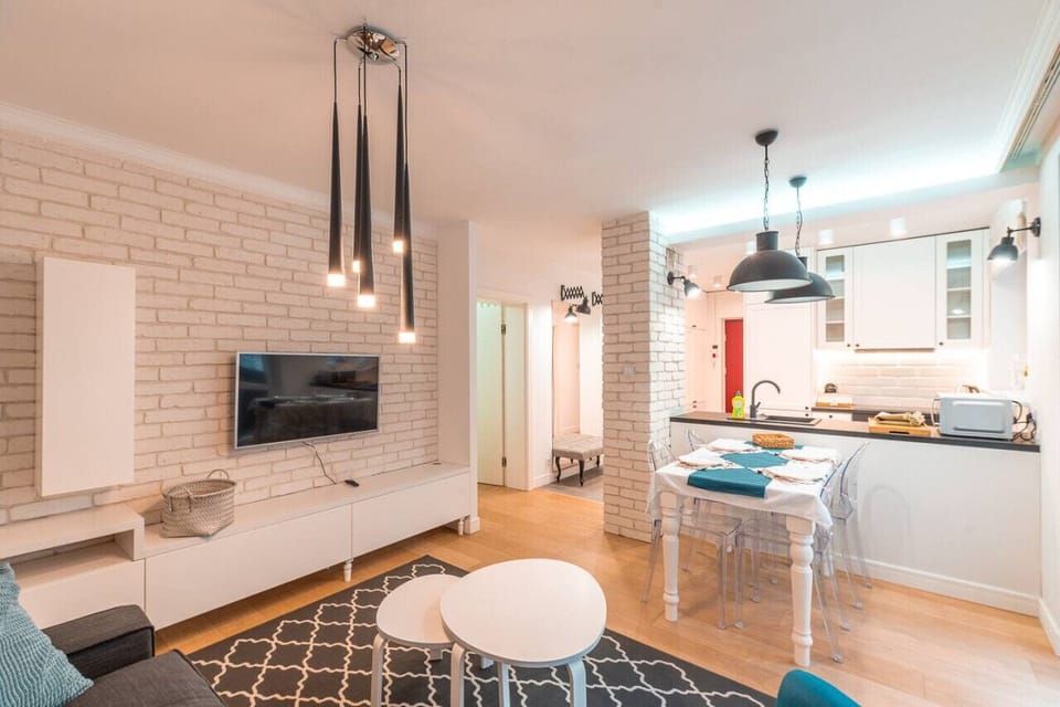 Comfortable Living Room with Sofa Bed and Smart TV | Book Now with RENTUJEMY