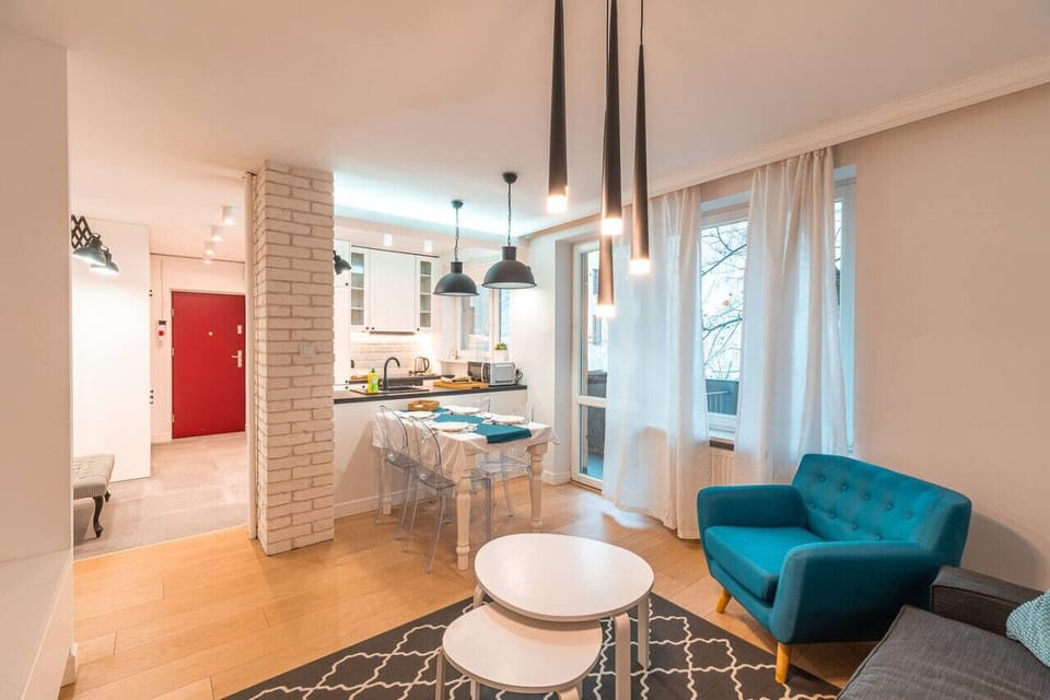 Comfortable Living Room with Sofa Bed and Smart TV | Book Now with RENTUJEMY