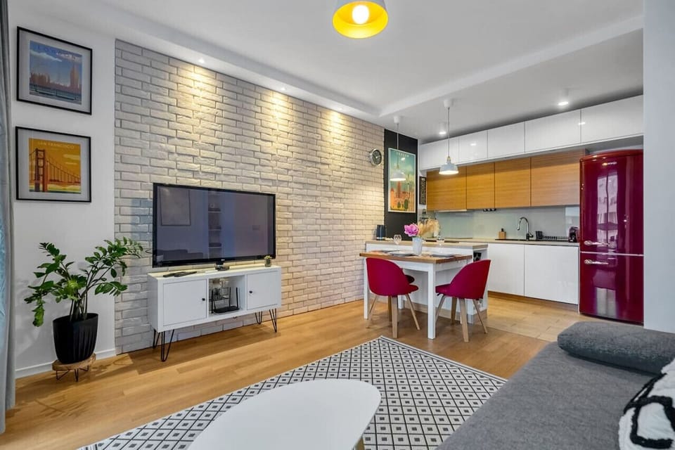 Main Living Area with a Smart TV- Book Now with RENTUJEMY.COM