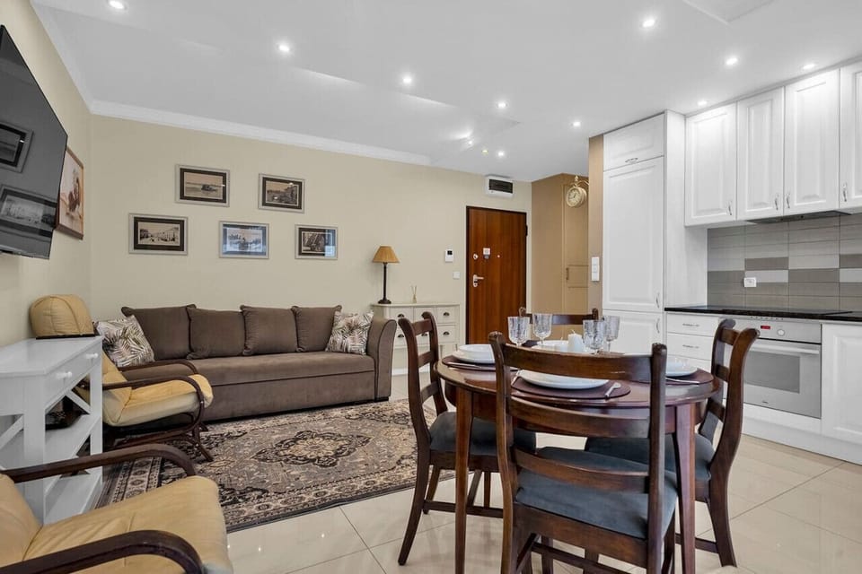 Comfortable Living Room with Sofa Bed and Smart TV | Book Now with RENTUJEMY
