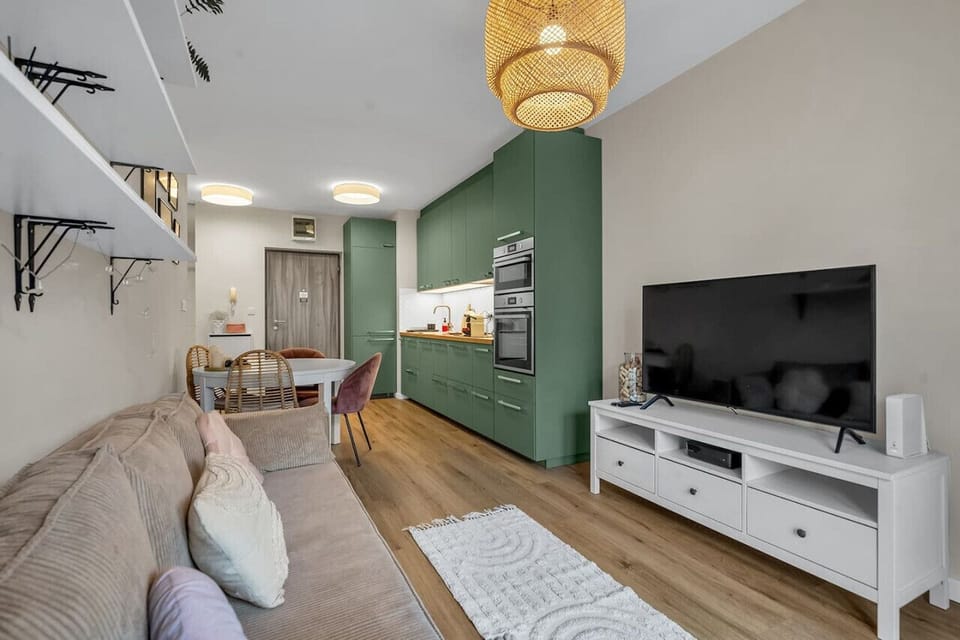 Comfortable Living Room with Sofa Bed and Smart TV | Book Now with RENTUJEMY