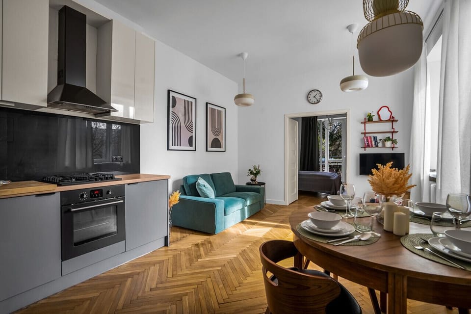 Comfortable Living Room with Sofa Bed and Smart TV | Book Now with RENTUJEMY