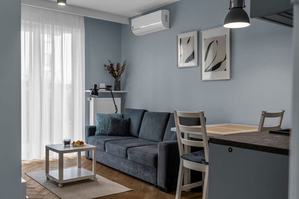 Comfortable Living Room with Sofa Bed and Smart TV| Book Now With RENTUJEMY