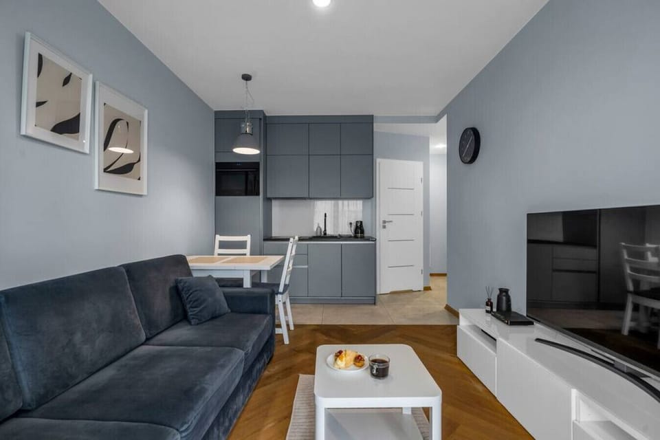 Comfortable Living Room with Sofa Bed and Smart TV| Book Now With RENTUJEMY