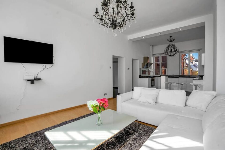 Comfortable Living Room with Sofa Bed and Smart TV | Book Now with RENTUJEMY