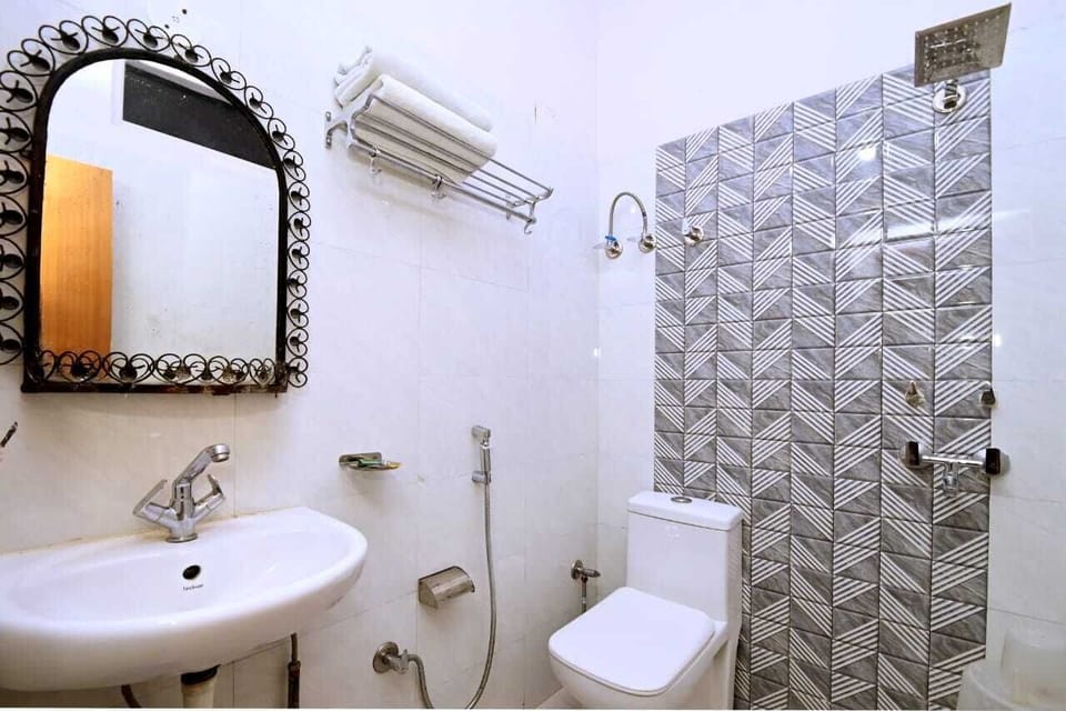 Shower, slippers, towels, soap